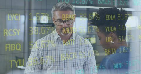 Diverse Team Analyzing Stock Market Data at Office