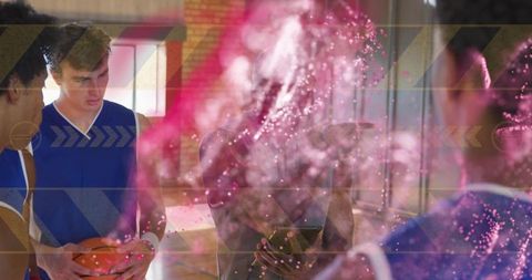 Dynamic Basketball Team Meeting with Vibrant Pink Particles