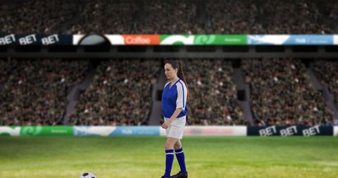 Female Soccer Player on Field Prepared for Action