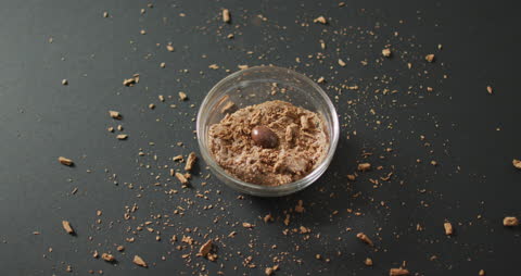 Chocolate Pudding with Chocolate Egg on Black Background