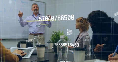 Diverse Team Analyzing Financial Data Projections in Modern Office - Download Free Stock Images Pikwizard.com