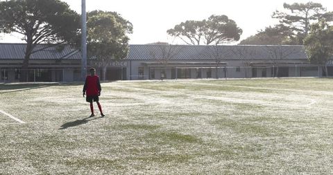 Youth Soccer Practice on Sunny Field with Focus on Ball Control