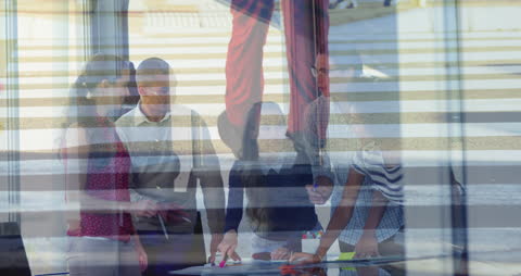 Group Collaboration with American Flag Overlay Symbolizing Teamwork