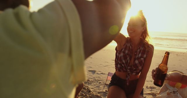 Friends Enjoying Beach Bonfire Party at Sunset - Download Free Stock Images Pikwizard.com