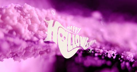 Happy Halloween Text Over Abstract Pink Background