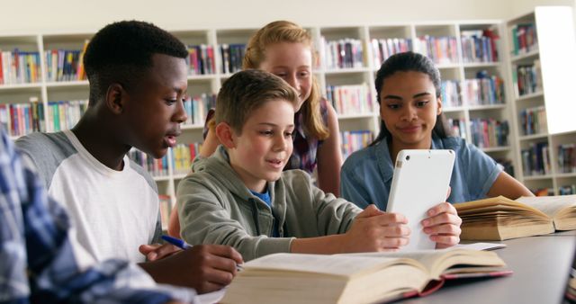 Diverse Students Using Tablet for Group Study in Library - Download Free Stock Images Pikwizard.com