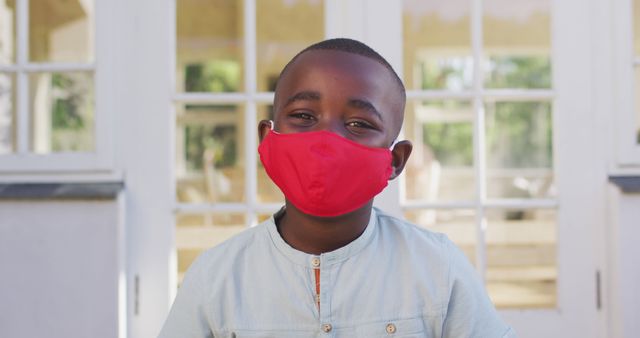 Happy African American Child Wearing Red Face Mask Outdoors - Download Free Stock Images Pikwizard.com