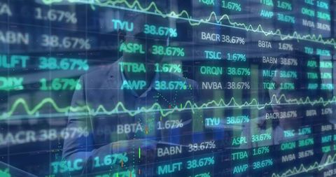 Businessman analyzing stock market trends with transparent touchscreen