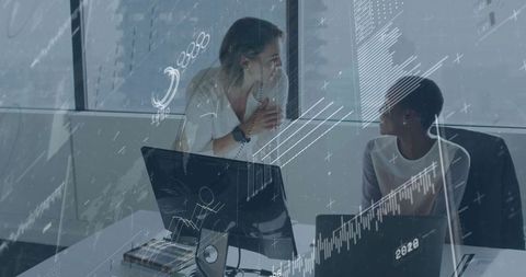 Collaborative Business Meeting on Data Analysis with Two Women