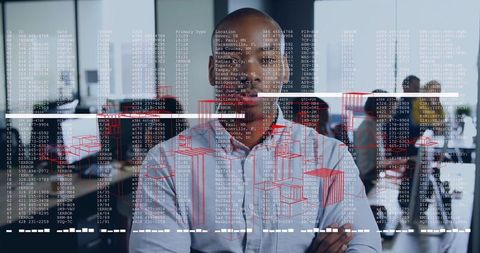 Confident Professional Overseeing Data-Driven Team in Modern Office