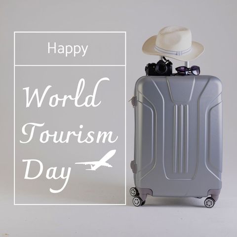 World tourism day celebration with suitcase and travel essentials