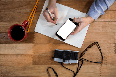 Transparent Workspace with Planner and Smartphone Interaction - Download Free Stock Videos Pikwizard.com