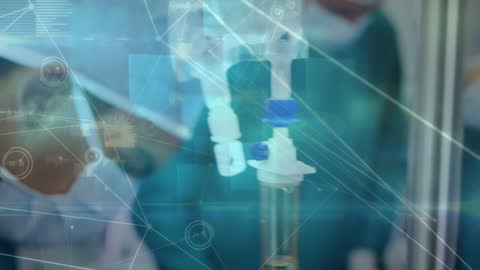 Surgeon in High-Tech Operating Room with Connected Data Networks