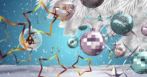 Festive baubles and metallic stars on white pine branch