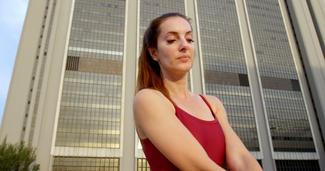 Young woman stretching outdoors in city - Download Free Stock Images Pikwizard.com