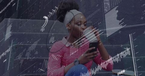 Woman checking phone while drinking coffee on urban steps with data chart overlay