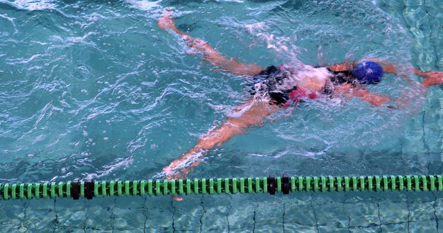 Swimmer Practicing Backstroke in Pool - Download Free Stock Images Pikwizard.com