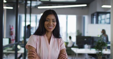 Confident Businesswoman Standing in Modern Office Environment