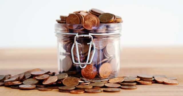 Glass Jar Filled with Coins for Savings and Financial Planning - Download Free Stock Images Pikwizard.com