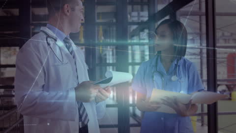 Diverse Doctors Collaborating in a Digitally Connected Environment