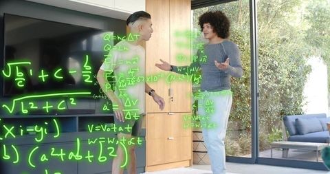 Young men discussing math with neon augmented reality tech formulas in sunlit living room