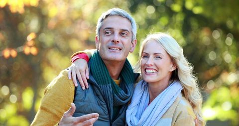 Happy Mature Couple Enjoying Outdoor Leisure in Park - Download Free Stock Images Pikwizard.com