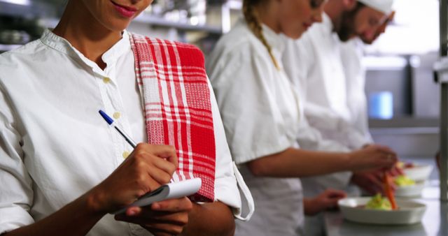 Team of Chefs Preparing Food in Professional Kitchen - Download Free Stock Images Pikwizard.com