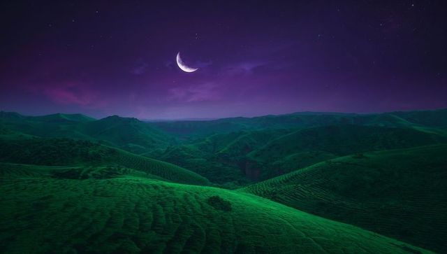 Serene Night Landscape Under Crescent Moon