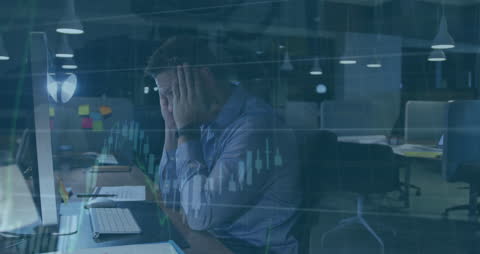 Businessman Exhausted by Financial Data Analysis in Office