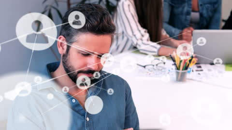 Businessman Engaging in Global Networking via Digital Tablet