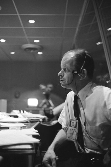 S63-09593 (15-16 May 1963) --- John A. Powers sits at the Public Affairs Officer console in Mercury Control Center at Cape Canaveral, Florida during the Mercury Atlas 9 (MA-9) 22-orbit mission of astronaut L. Gordon Cooper Jr. Photo credit: NASA