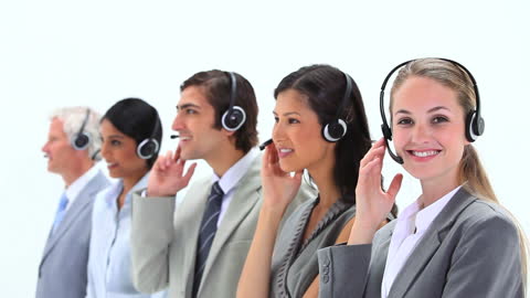 Customer Service Team Communicating with Headsets