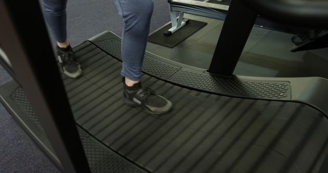 Person Running on Curved Treadmill in Gym - Download Free Stock Images Pikwizard.com