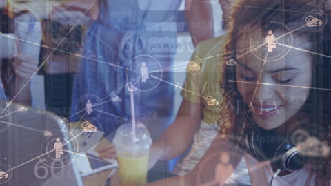 Diverse Coworkers Collaborating in Modern Office with Digital Network