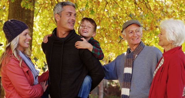 Multi-generational Family Enjoying Autumn Day Outdoors - Download Free Stock Images Pikwizard.com