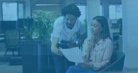 Team Collaboration and Data Analysis in Modern Office with Technology Overlay