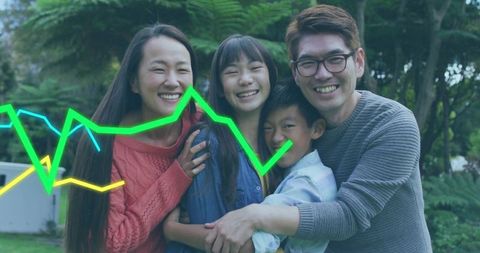 Smiling family of four embracing in leafy park with neon data graph overlay showing growth
