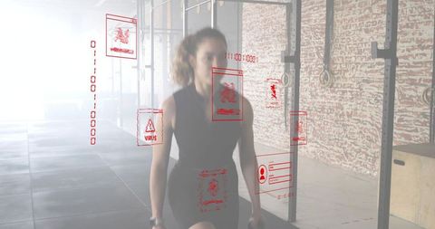 Backlit athlete performing weighted lunge with dumbbells and red ar fitness hud