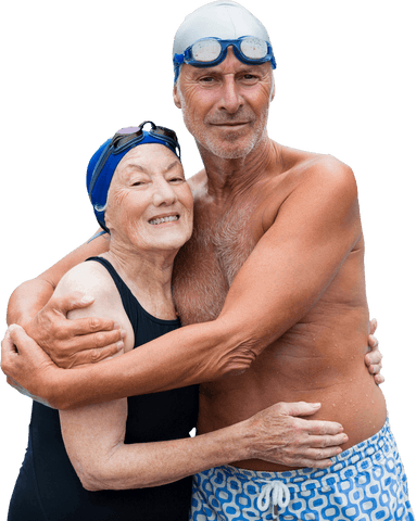 Senior couple smiling and embracing, wearing swim goggles. Captures joyful relationship in active, aquatic lifestyle. Useful for illustrating themes of healthy aging, exercise, companionship, and well-being.