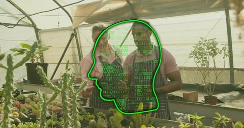 Horticulturists Using Tablet and Inspecting Greenhouse Plants and Technology Overlay