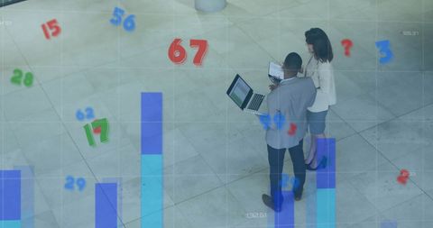 Team Analyzing Financial Data with Technology Overlay