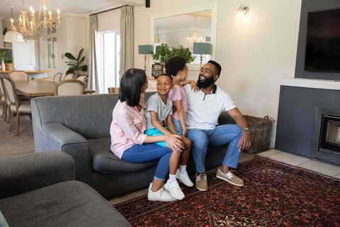 Happy Family Bonding in Cozy Bright Living Room