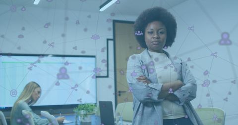 Confident African American Woman in Modern Office with Digital Network Overlay