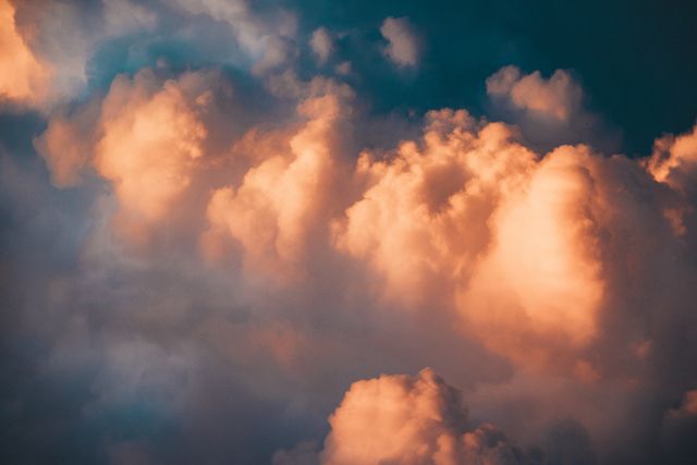 Dramatic Cloudscape with Golden Light at Dusk - Download Free Stock Photos Pikwizard.com