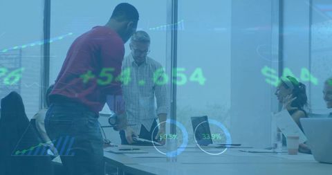 Business Team Collaborating on Financial Analytics with Data Overlay in Modern Boardroom