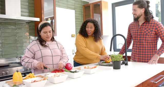 Friends Cooking Together in Modern Kitchen, Preparing Fresh Vegetables - Download Free Stock Images Pikwizard.com