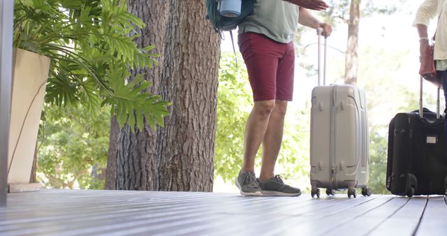 Travelers Arriving with Luggage at Outdoor Location - Download Free Stock Images Pikwizard.com