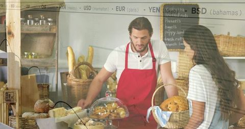 Artisanal Baker Serving Customer at Rustic Bakery Counter with Baskets of Fresh Bread