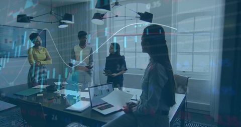 Businesswomen Collaborating on Financial Strategy in Modern Office