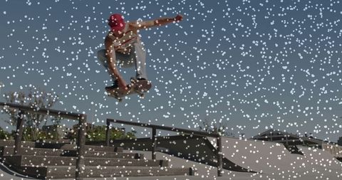 Skateboarder Performing Aerial Trick in Urban Skate Park
